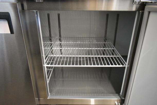 BRAND NEW SCRATCH AND DENT! 2024 Avantco 178APPT91HC Stainless Steel Commercial Pizza Prep Table on Commercial Casters. 115 Volts, 1 Phase. Tested and Working! - Image 7 of 9