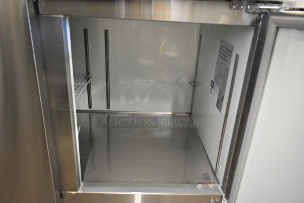 BRAND NEW SCRATCH AND DENT! 2024 Avantco 178APPT91HC Stainless Steel Commercial Pizza Prep Table on Commercial Casters. 115 Volts, 1 Phase. Tested and Working! - Image 8 of 9