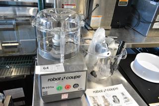 BRAND NEW SCRATCH AND DENT! Robot Coupe R 101 B 2.5 Qt. / 2.4 Liter Clear Batch Bowl Food Processor w/ S Blade and Accessories. 120 Volts, 1 Phase. Tested and Working!