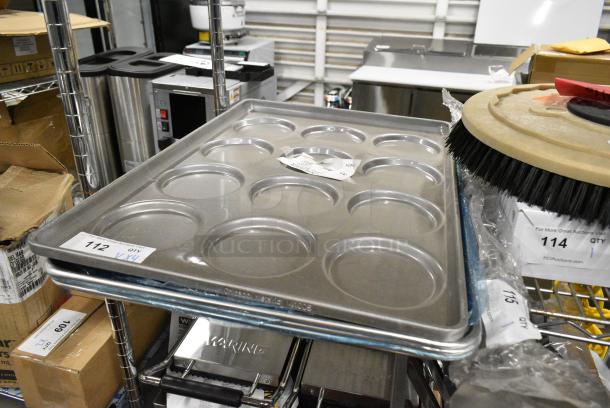 4 BRAND NEW SCRATCH AND DENT! Items Including Chicago Metallic 41005 Glazed Aluminized Steel 12 Mold 5.09 oz. Individual Hamburger Bun / Muffin Top / Cookie Pan - 17 3/4" x 25 3/4" and 3 Metal Full Size Baking Pans. 4 Times Your Bid! - Image 1 of 3