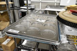 4 BRAND NEW SCRATCH AND DENT! Items Including Chicago Metallic 41005 Glazed Aluminized Steel 12 Mold 5.09 oz. Individual Hamburger Bun / Muffin Top / Cookie Pan - 17 3/4" x 25 3/4" and 3 Metal Full Size Baking Pans. 4 Times Your Bid!