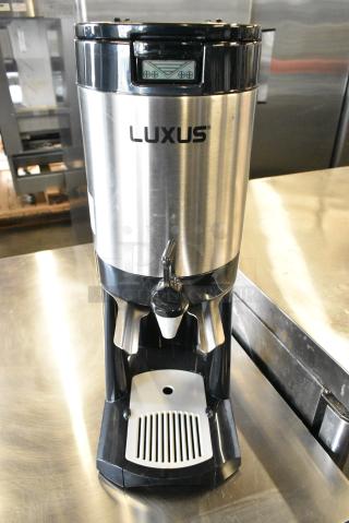 Fetco Luxus S4SO-10-1 Stainless Steel Commercial Countertop Beverage Holder Dispenser on Stand.