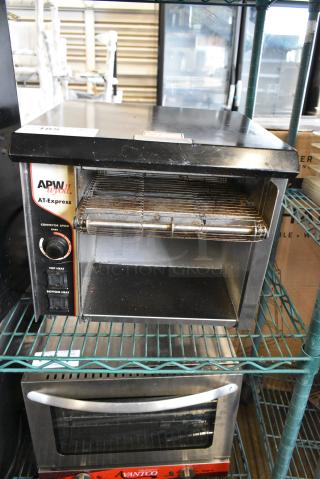 APW Wyott AT EXPRESS-1 Stainless Steel Commercial Countertop Conveyor Toaster Oven. 120 Volts, 1 Phase. Tested and Working!