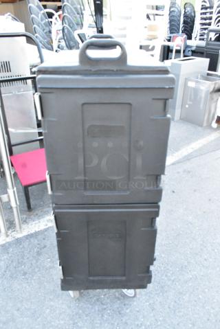 Carlisle Poly Black 2 Compartment Portable Catering Case on Commercial Casters.