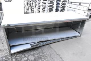 Regency 600EBT3096D 30" x 96" 16 Gauge Type 304 Stainless Steel Enclosed Base Table with Sliding Doors and Adjustable Midshelf