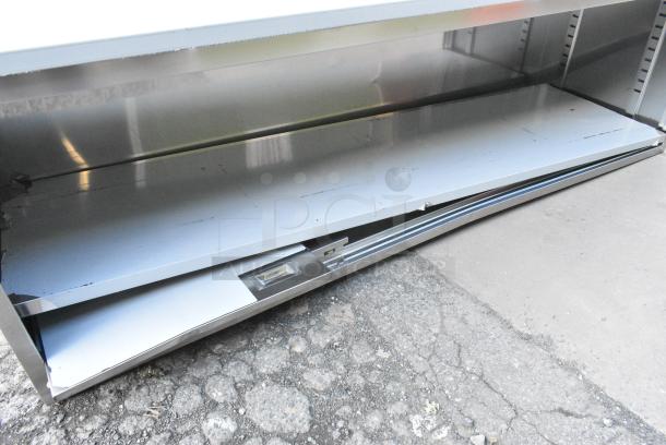 Regency 600EBT3096D 30" x 96" 16 Gauge Type 304 Stainless Steel Enclosed Base Table with Sliding Doors and Adjustable Midshelf - Image 3 of 6