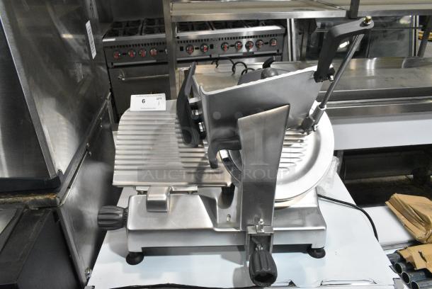 BRAND NEW SCRATCH AND DENT! 2024 Hobart Ecoline ECO12 Stainless Steel Commercial Countertop Meat Slicer w/ Blade Sharpener. 115 Volts, 1 Phase. Tested and Working But Needs Blade Guard Replaced To Turn The Cutting Wheel - Image 1 of 5