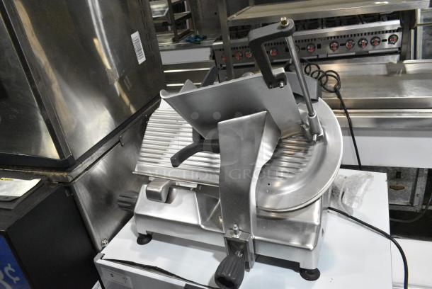 BRAND NEW SCRATCH AND DENT! 2024 Hobart Ecoline ECO12 Stainless Steel Commercial Countertop Meat Slicer w/ Blade Sharpener. 115 Volts, 1 Phase. Tested and Working But Needs Blade Guard Replaced To Turn The Cutting Wheel - Image 2 of 5