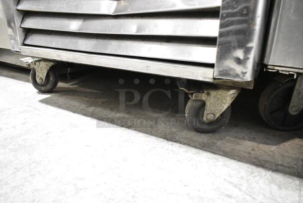 2017 Atosa MBF8505 Stainless Steel Commercial Single Door Reach In Cooler w/ Poly Coated Racks on Commercial Casters. 115 Volts, 1 Phase. Tested and Working! - Image 4 of 6