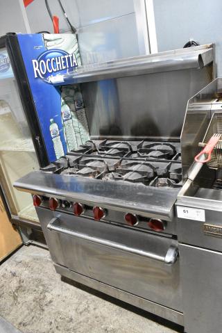 Stainless Steel Commercial Natural Gas Powered 6 Burner Range w/ Oven, Over Shelf and Back Splash on Commercial Casters.