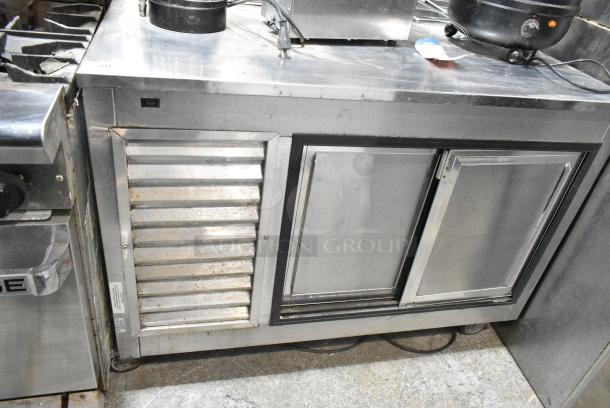Leader LB48 S/C Stainless Steel Commercial 2 Door Undercounter Cooler on Commercial Casters. 115 Volts, 1 Phase. Tested and Powers On But Does Not Get Cold - Image 1 of 5
