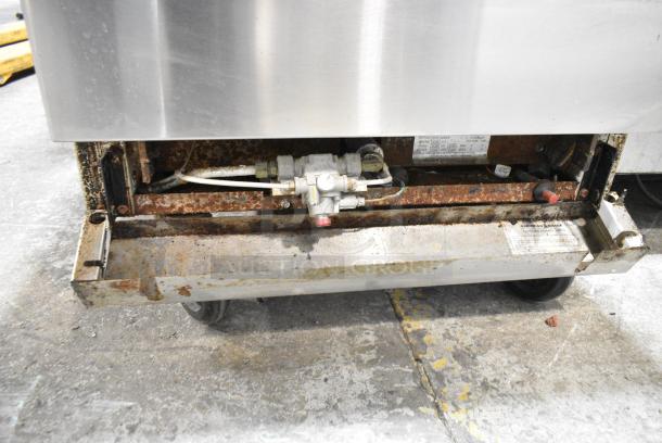 American Range Stainless Steel Commercial Natural Gas Powered 4 Burner Range w/ Oven, Over Shelf and Back Splash on Commercial Casters. - Image 7 of 13