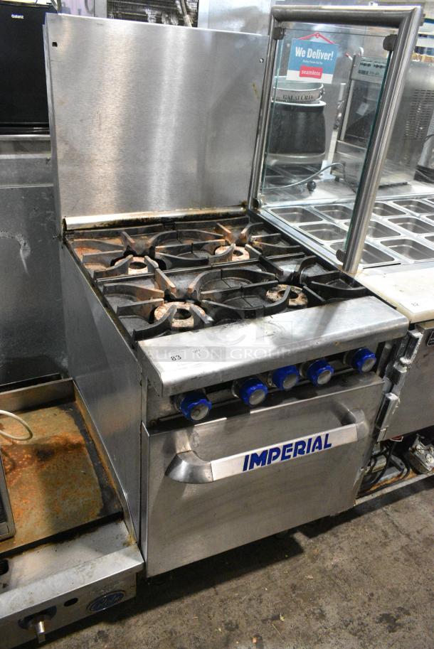 Imperial IR-4 Stainless Steel Commercial Natural Gas Powered 4 Burner Range w/ Oven and Back Splash. - Image 1 of 6