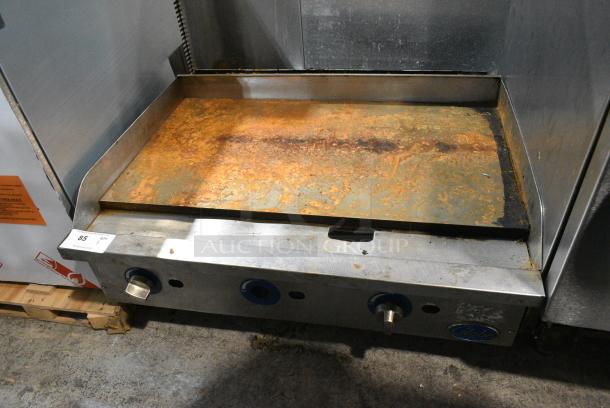 Globe Stainless Steel Commercial Countertop Natural Gas Powered Flat Top Griddle. - Image 1 of 5
