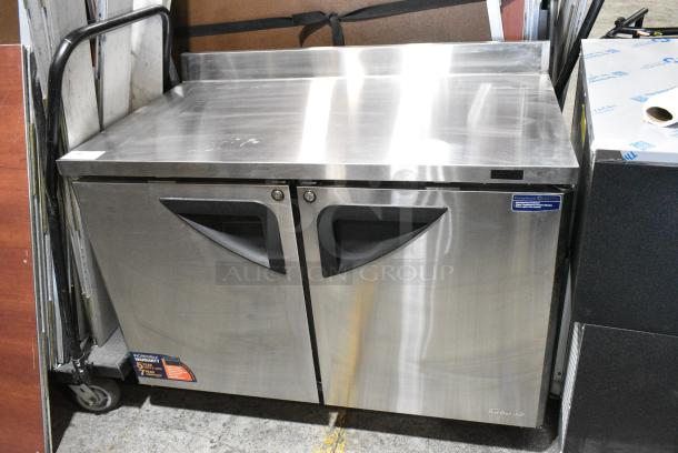BRAND NEW SCRATCH AND DENT! Turbo Air TWF-48SD-N Stainless Steel Commercial 2 Door Work Top Freezer on Commercial Casters. 115 Volts, 1 Phase. Tested and Working! - Image 1 of 6