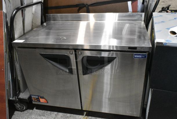 BRAND NEW SCRATCH AND DENT! Turbo Air TWF-48SD-N Stainless Steel Commercial 2 Door Work Top Freezer on Commercial Casters. 115 Volts, 1 Phase. Tested and Working! - Image 2 of 6