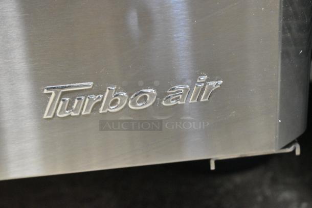 BRAND NEW SCRATCH AND DENT! Turbo Air TWF-48SD-N Stainless Steel Commercial 2 Door Work Top Freezer on Commercial Casters. 115 Volts, 1 Phase. Tested and Working! - Image 3 of 6
