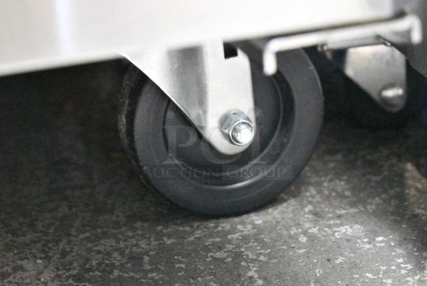 BRAND NEW SCRATCH AND DENT! Turbo Air TWF-48SD-N Stainless Steel Commercial 2 Door Work Top Freezer on Commercial Casters. 115 Volts, 1 Phase. Tested and Working! - Image 4 of 6