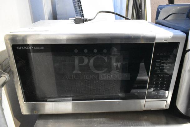 Sharp Carousel SMC1132CS Metal Countertop Microwave Oven w/ Plate. 120 Volts, 1 Phase. - Image 1 of 5