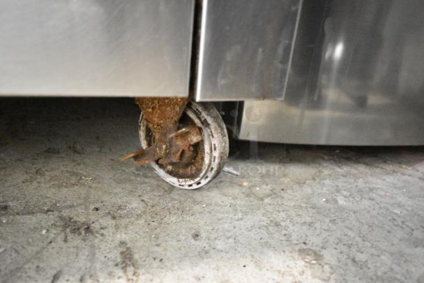 Garland Stainless Steel Commercial Natural Gas Powered 4 Burner Range w/ Oven, Over Shelf and Back Splash on Commercial Casters. - Image 7 of 7