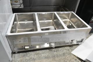 BRAND NEW SCRATCH AND DENT! 2024 ServIt 423EST3WS Stainless Steel Commercial Three Pan Sealed Well Electric Steam Table with Adjustable Undershelf. 120 Volts, 1 Phase. Tested and Working!