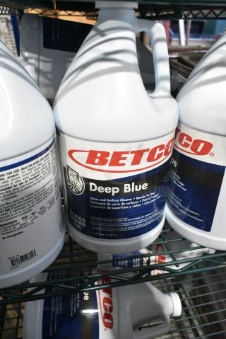 23 BRAND NEW SCRATCH AND DENT! Betco Deep Blue Glass and Surface Cleaner Jugs. 23 Times Your Bid!