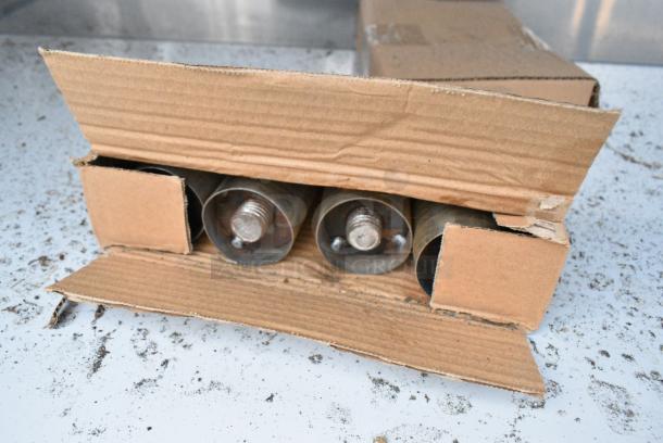 BRAND NEW SCRATCH AND DENT! Regency 600EBT2496 24" x 96" 16 Gauge Type 304 Stainless Steel Enclosed Base Table with Open Front and Adjustable Midshelf - Image 5 of 6