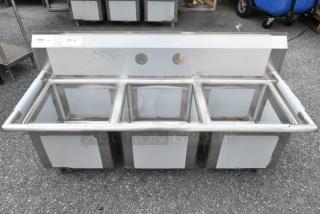 BRAND NEW SCRATCH AND DENT! Regency 600S31515 54" 16-Gauge Stainless Steel Three Compartment Commercial Sink with Stainless Steel Legs, Cross Bracing, and without Drainboard - 15" x 15" x 12" Bowls. No Legs.
