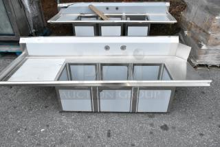 BRAND NEW SCRATCH AND DENT! Regency 600DDTS384LFT 16-Gauge 7' Soiled / Dirty Dish Table with 3-Compartment Sink - 16" x 20" x 14" Bowls - Left Drainboard. No Legs.