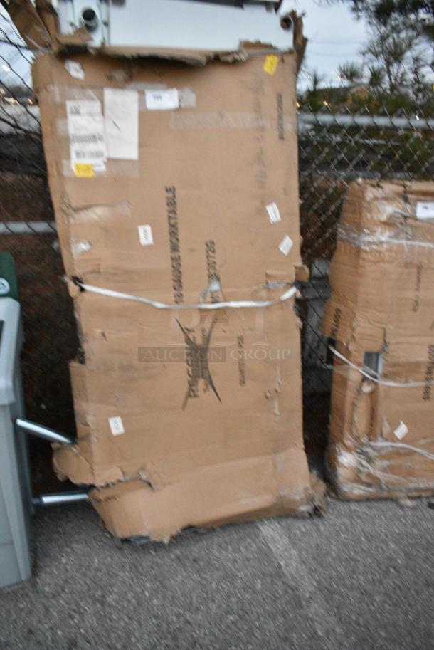 BRAND NEW SCRATCH AND DENT! 600TB3072G Regency 30" x 72" 18-Gauge 304 Stainless Steel Commercial Work Table with 4" Backsplash and Galvanized Undershelf. May Be Missing Pieces. - Image 1 of 3