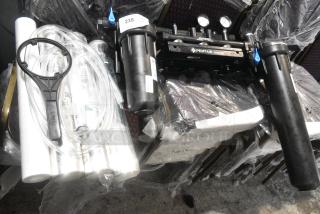 ALL ONE MONEY! Lot of BRAND NEW SCRATCH AND DENT!  Water Filtration System Including 3 EV9612-56 Cartridges, 2 Pentair Cartridge Holder, Pentair Water Filtration Base.