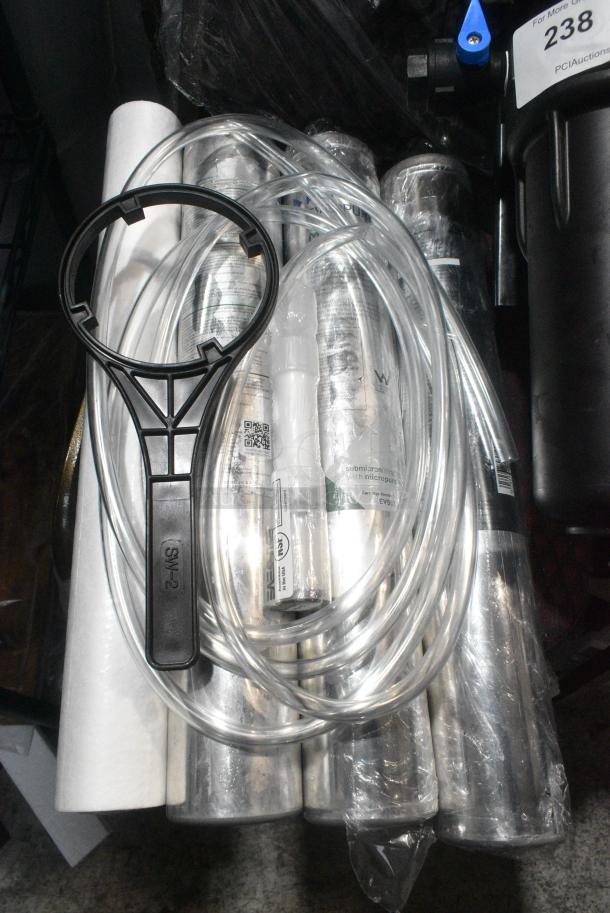 ALL ONE MONEY! Lot of BRAND NEW SCRATCH AND DENT!  Water Filtration System Including 3 EV9612-56 Cartridges, 2 Pentair Cartridge Holder, Pentair Water Filtration Base. - Image 15 of 16