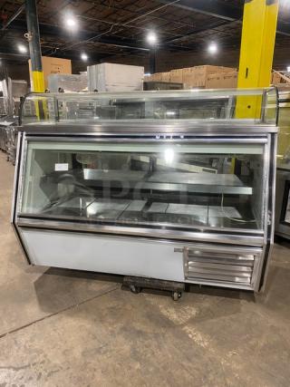 Leader 7/11 Style Commercial Refrigerated Slanted Glass Meat Deli Display Case! With Additional Top Display! With Rear Storage Compartment! With Rear Access Sliding Glass Doors! With Stainless Steel Shelves! Model: SDL72 S/C SN: PU07s0711! 115V 1 Phase! - Item #1154926