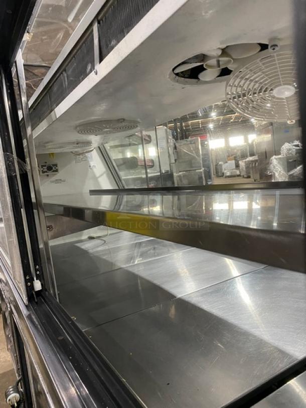 Leader 7/11 Style Commercial Refrigerated Slanted Glass Deli Display Case! With Additional Top Display! With Rear Storage Compartment! With Rear Access Sliding Glass Doors! With Stainless Steel Shelves! Model: SDL72 S/C SN: PU07s0711! 115V 1 Phase! - Image 5 of 10