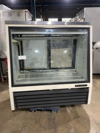 True Commercial Slanted Glass Front Refrigerated Meat Deli Display Case! With Poly Coated Wire Rack! With Rear Sliding Glass Doors! Model: TSID-48-2 SN: 1-4321514! 115V 1 Phase! Working When Removed! - Item #1155360