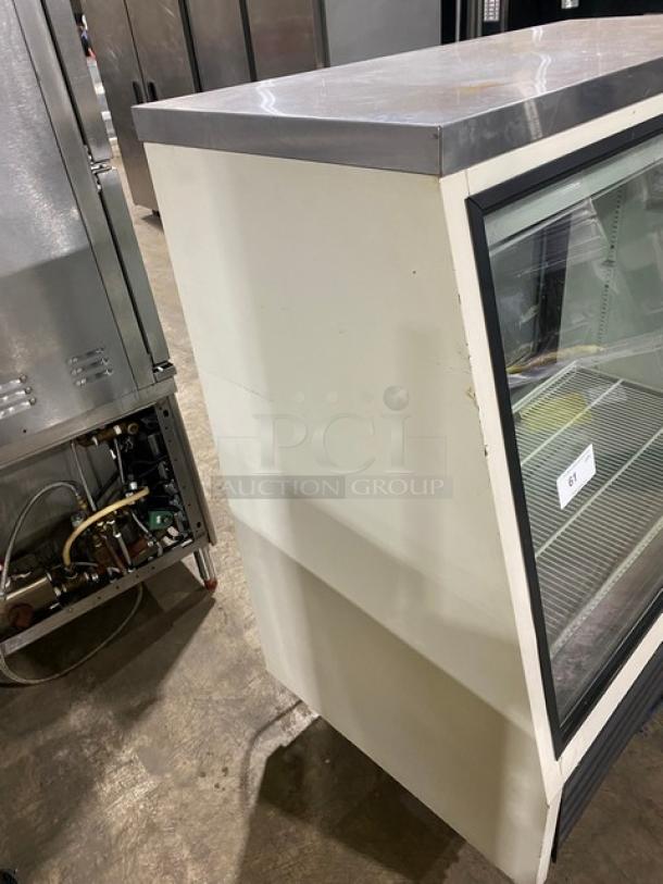 True Commercial Slanted Glass Front Refrigerated Meat Deli Display Case! With Poly Coated Wire Rack! With Rear Sliding Glass Doors! Model: TSID-48-2 SN: 1-4321514! 115V 1 Phase! Working When Removed! - Image 4 of 8