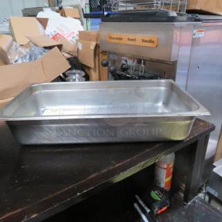 One Full Size 4 Inch Deep Hotel Pan.