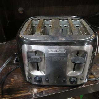 One Black And Decker 4 Slice Toaster.