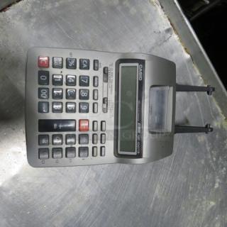 One Casio Calculator.