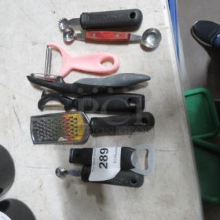 One Lot Of 8 Assorted Utensils.