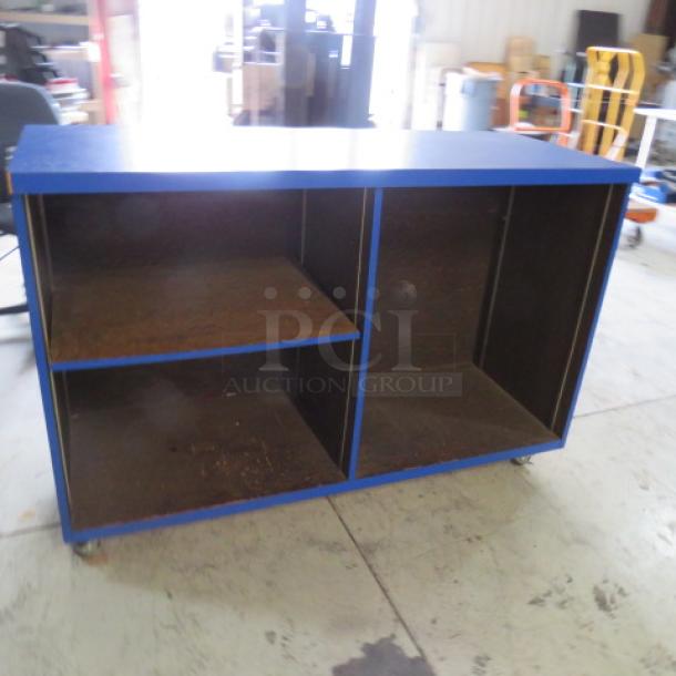 One Blue Laminate Hostess/Serving Stand With Under Storage On Casters. 60X24X40. - Image 2 of 3