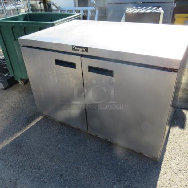One 2 Door Delfield Under Counter Refrigerator With 1 Rack On Casters. #UC4448N. 120 Volt. 48X32X34 - Image 1 of 1