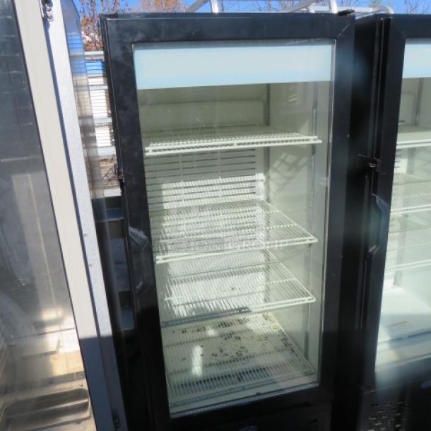 One Carrier 1 Door Glass Display Cooler With 3 Racks. 120 Volt. Model# MC300. 24.5X24X62 - Image 1 of 2