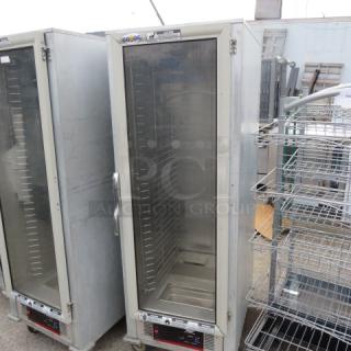 One Cozoc Heat And Hold On Casters. 120 Volt. Model# HPC7008.  23X32X67
