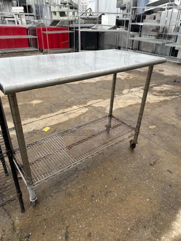 One Stainless Steel Table With A Metro Under Shelf On Casters. 49.5X24X40 - Image 1 of 1