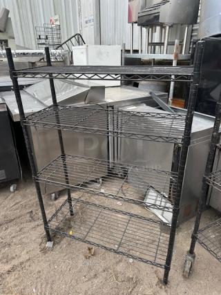 One Black Metro Shelf With 4 Shelves. 36X14X54