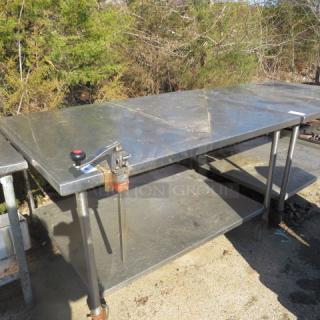 One Stainless Steel Table With SS Under Shelf And A 10lb Can Opener, On Casters. 60X45X36