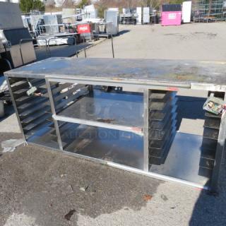 One Stainless Steel Wall Mount Work Table WIth 4 Ticket Rails, Under Racks, And 3 Hatco Glo Ray Food Warmers. 81X31X35