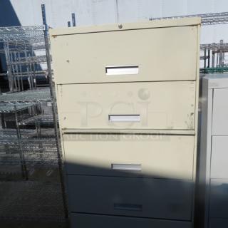 One 4 Drawer Metal File Cabinet. 36X18X52