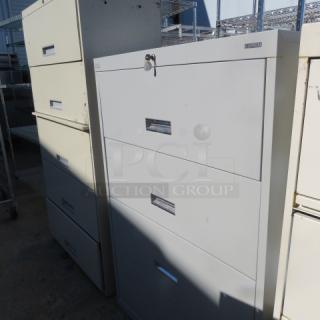 One 4 Drawer Metal File Cabinet With Key. 36X18X52